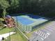 Community tennis courts with a deck, perfect for relaxing after a match at 6784 Tilton Ln, Peachtree Corners, GA 30360