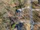An overhead shot of the house showing its position on a lot in a mature neighborhood at 1522 Wood Valley Dr, Marietta, GA 30066