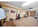 Finished basement with carpet, paneled walls, various decor and plenty of space for activities at 1522 Wood Valley Dr, Marietta, GA 30066