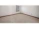 Bedroom with a single window with wood trim and neutral carpet at 1522 Wood Valley Dr, Marietta, GA 30066