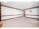 Bright living room with neutral carpet, trim, and an open floor plan at 1522 Wood Valley Dr, Marietta, GA 30066