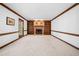 Spacious living room featuring a brick fireplace and built-in shelves at 1522 Wood Valley Dr, Marietta, GA 30066