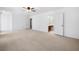 Spacious main bedroom with neutral carpet and access to an en-suite bathroom at 1522 Wood Valley Dr, Marietta, GA 30066