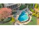Aerial view of backyard featuring a custom-designed pool and mature landscaping at 2260 Wood Falls Dr, Cumming, GA 30041