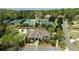 Overhead view of the community clubhouse with tennis courts, swimming pool, and manicured grounds at 2260 Wood Falls Dr, Cumming, GA 30041