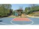 Basketball court and playground in a park-like setting, encouraging active play and community engagement at 2260 Wood Falls Dr, Cumming, GA 30041