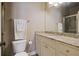 Well-lit bathroom featuring granite countertop vanity and walk-in shower at 2260 Wood Falls Dr, Cumming, GA 30041