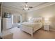 Comfortable bedroom with natural light, neutral tones, and ample space at 2260 Wood Falls Dr, Cumming, GA 30041