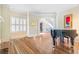 Elegant foyer showcases hardwood floors, staircase, and arched doorways at 2260 Wood Falls Dr, Cumming, GA 30041