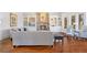 Spacious living room with a fireplace, built-in shelving, and lots of natural light at 2260 Wood Falls Dr, Cumming, GA 30041
