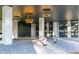 Grand entrance featuring modern lighting, valet parking, and stylish architectural details at The Dillon at 2425 Peachtree Ne Rd # 604, Atlanta, GA 30305