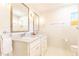 Bright bathroom with double vanity, marble countertops, and modern fixtures at 3605 Wood Valley Ne Ct, Brookhaven, GA 30319