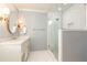 Bathroom featuring a glass enclosed shower and marble countertops at 3605 Wood Valley Ne Ct, Brookhaven, GA 30319
