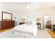 Serene bedroom featuring a large bed, plush rug, and coordinated decor exudes comfort and style at 3605 Wood Valley Ne Ct, Brookhaven, GA 30319