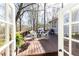 Beautiful deck with seating and grill providing an idyllic outdoor living space and gorgeous views at 3605 Wood Valley Ne Ct, Brookhaven, GA 30319