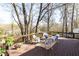 Outdoor deck with seating area and a view of the natural surroundings at 3605 Wood Valley Ne Ct, Brookhaven, GA 30319