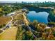 Panoramic aerial view of a beautiful blue lake framed by a vibrant Autumn forest at 966 Tilden Nw St, Atlanta, GA 30318