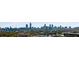 Stunning panoramic view of the city skyline surrounded by a canopy of lush greenery at 966 Tilden Nw St, Atlanta, GA 30318