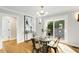Elegant dining room with natural light and stylish light fixture at 966 Tilden Nw St, Atlanta, GA 30318
