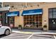 Charming storefront with large window display for Perrines Wine Shop with ample parking at 966 Tilden Nw St, Atlanta, GA 30318