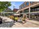 Inviting patio for outdoor seating at The Works, surrounded by beautiful landscaping and greenery at 966 Tilden Nw St, Atlanta, GA 30318