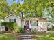 Charming single-story home with a landscaped front yard and inviting entrance at 966 Tilden Nw St, Atlanta, GA 30318