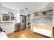 Well-lit kitchen featuring stainless steel appliances, and modern finishes at 966 Tilden Nw St, Atlanta, GA 30318
