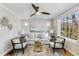 Cozy living room featuring hardwood floors, a ceiling fan, and natural light at 966 Tilden Nw St, Atlanta, GA 30318