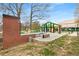 Park Pavilion with colorful walls, a picnic table, concrete pad and mature trees at 966 Tilden Nw St, Atlanta, GA 30318