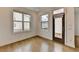 Well-lit dining area with hardwood floors and sliding door access to the deck at 1273 Harvest Park Ln, Suwanee, GA 30024