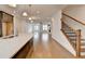 Modern kitchen featuring an island with quartz countertops, pendant lights, and stainless steel appliances at 1273 Harvest Park Ln, Suwanee, GA 30024