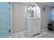 Bathroom featuring new vanity with tiled floors and large mirror at 1583 Elixir Sw Ave, Atlanta, GA 30314