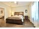 Spacious bedroom features hardwood floors, natural light, and neutral colors at 1583 Elixir Sw Ave, Atlanta, GA 30314