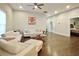 Bright and airy living room with hardwood floors and a neutral color palette, offering a versatile space for relaxation at 1583 Elixir Sw Ave, Atlanta, GA 30314