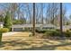 Ranch home with mature trees and landscaped front yard at 2173 Lebaron Ne Dr, Atlanta, GA 30345