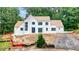 Charming white brick home features a modern design, dark trimmed windows and a newly installed driveway at 2983 Habersham Nw Ct, Atlanta, GA 30305
