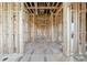 Bare stud framing of the long hallway, showing construction for a home's interior at 2983 Habersham Nw Ct, Atlanta, GA 30305