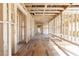 Long hallway under construction featuring exposed wood framing, allowing for customization and design at 2983 Habersham Nw Ct, Atlanta, GA 30305