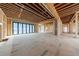 Open-concept living room with framed construction and large, black-trimmed windows at 2983 Habersham Nw Ct, Atlanta, GA 30305
