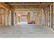 Open-concept living room under construction showcasing exposed framing and a staircase to the second level at 2983 Habersham Nw Ct, Atlanta, GA 30305