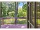 Beautiful wood deck showcasing peaceful views of the surrounding lush, green landscape at 4373 Sun Valley Blvd, Atlanta, GA 30344