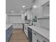 A well-appointed kitchen featuring white shaker cabinets, granite countertops, and stainless appliances at 4373 Sun Valley Blvd, Atlanta, GA 30344