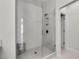 Modern bathroom featuring a glass-enclosed shower with stylish white tile and sleek fixtures at 1181 Rambler Cross, Atlanta, GA 30312