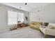 Neutral Bedroom with decorations, a crib, and a cozy rocking chair by a window at 1181 Rambler Cross, Atlanta, GA 30312