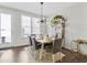 Inviting dining area filled with natural light, modern chandelier, and stylish decor at 1181 Rambler Cross, Atlanta, GA 30312