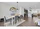 Light and bright dining room with modern light fixture and open floor plan at 1181 Rambler Cross, Atlanta, GA 30312