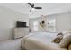Spacious main bedroom with ample natural light, dresser, and comfortable king bed at 1181 Rambler Cross, Atlanta, GA 30312