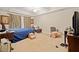 Spacious bedroom featuring a carpet floor, curtains, and neutral wall paint at 153 Newcastle Walk, Woodstock, GA 30188