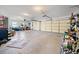 Spacious three car garage with storage and auto door openers is ready for your vehicles and projects at 153 Newcastle Walk, Woodstock, GA 30188