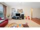 Living room showcasing a fireplace, built-in shelves, and a comfortable seating area at 153 Newcastle Walk, Woodstock, GA 30188